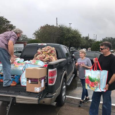Cathy & Eric Carter (Houston First Baptist-Sienna) help fill the truck so two young ladies have a very special Christmas!